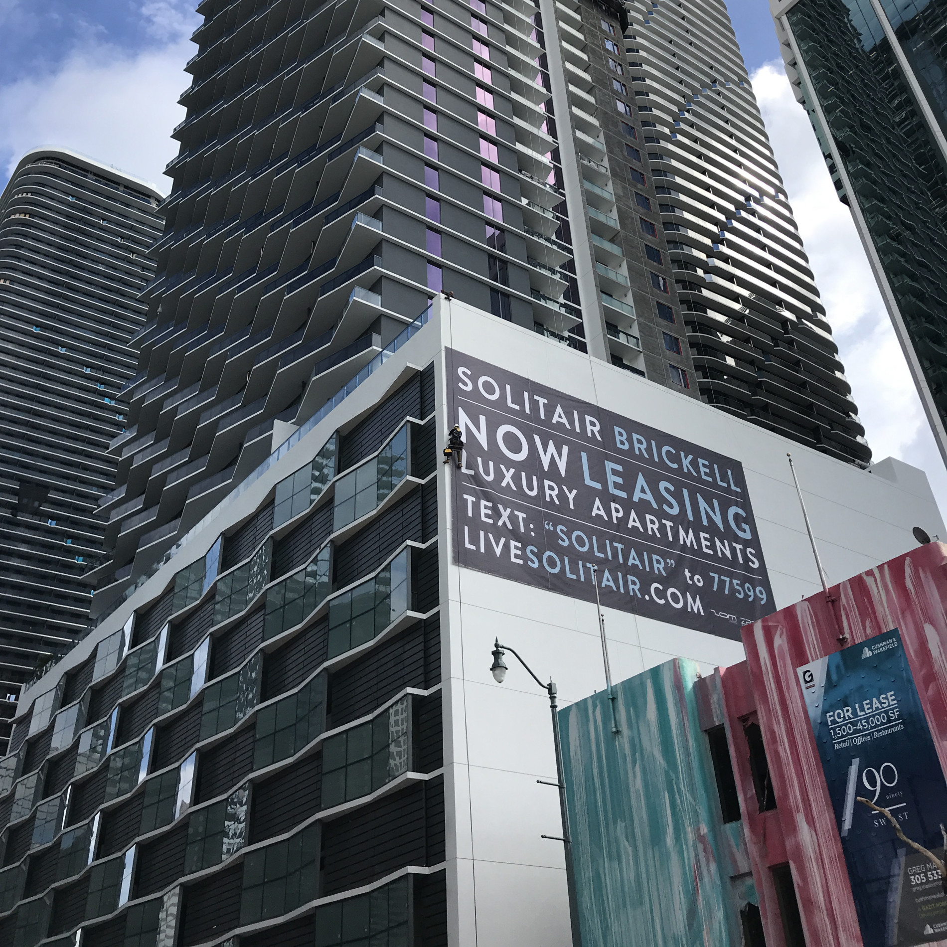 Highrise Building Banner Installation in Miami Florida.