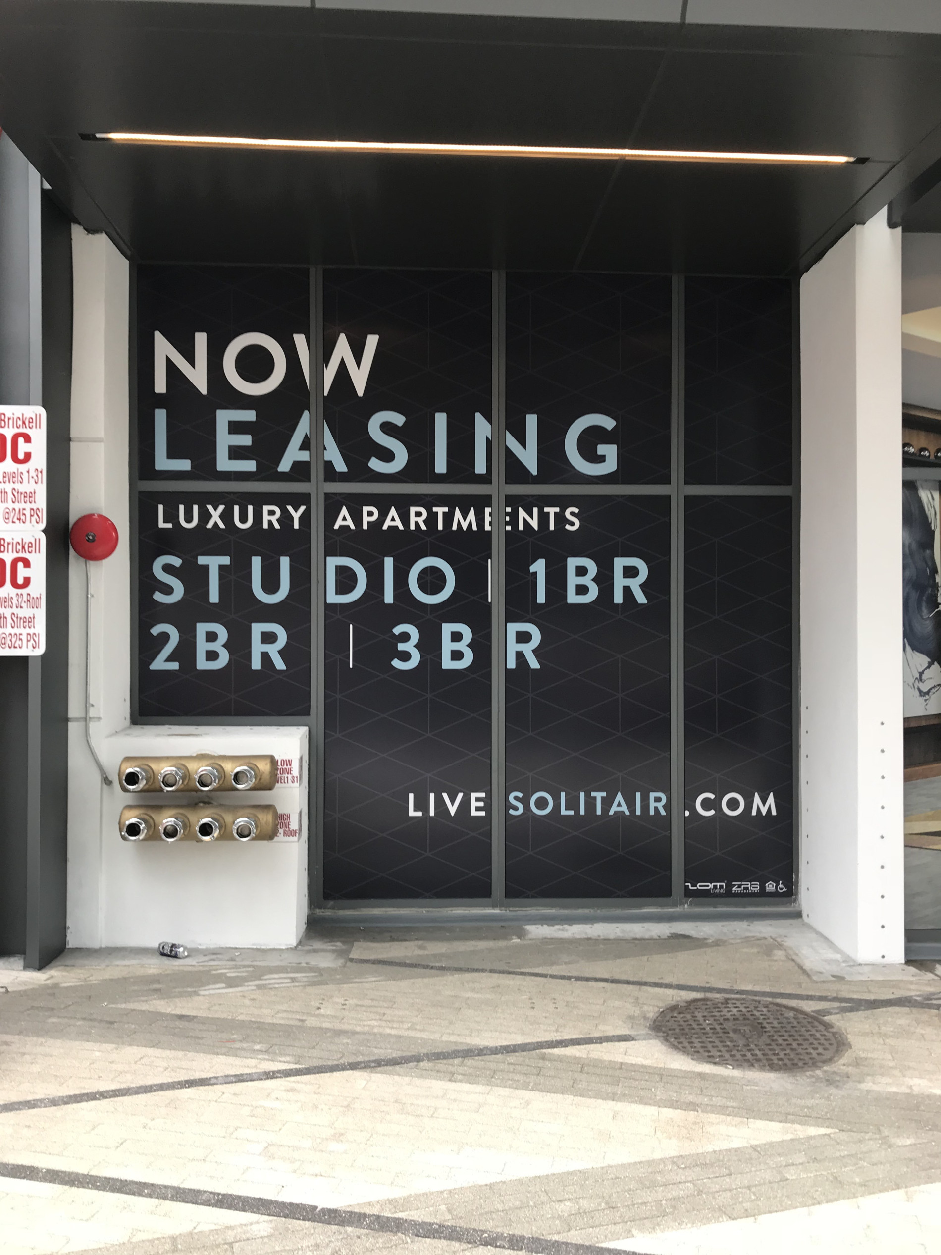 Highrise Building Banner Installation in Miami Florida.